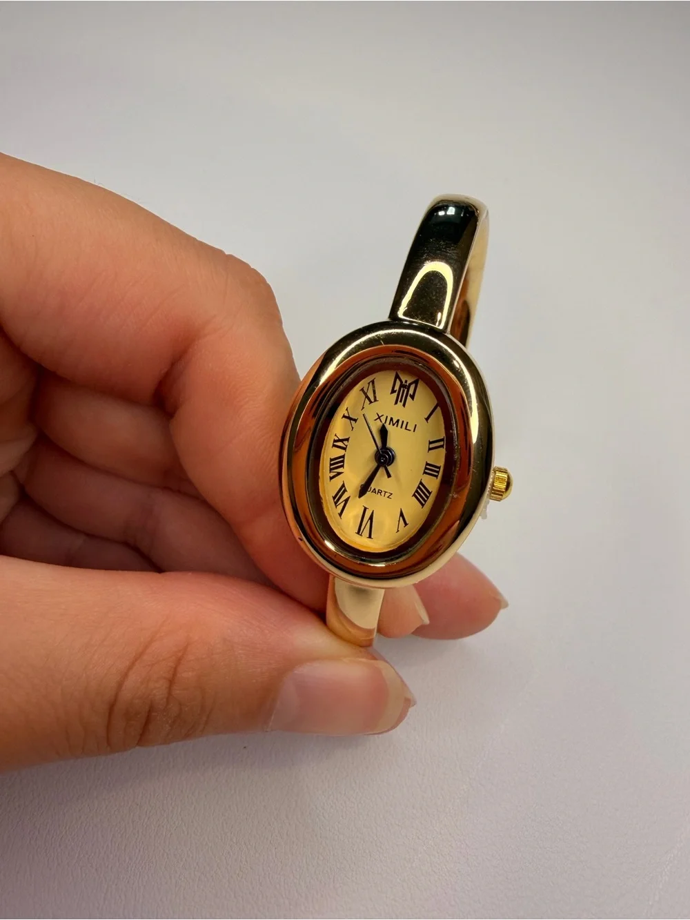 Elegant Gold-Tone Stainless Steel Bangle Watch - Picture 13 of 15